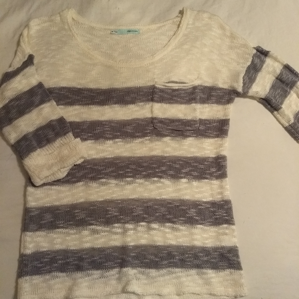 Gray and white sweater